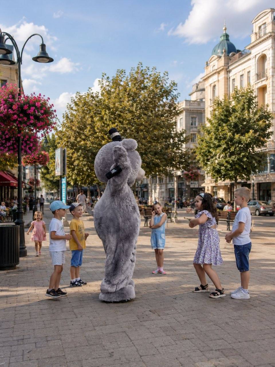Kids & mascot outdoors